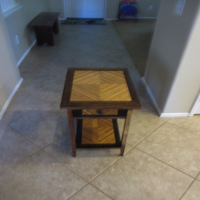 Zebra wood, walnut, and imbue veneer table
